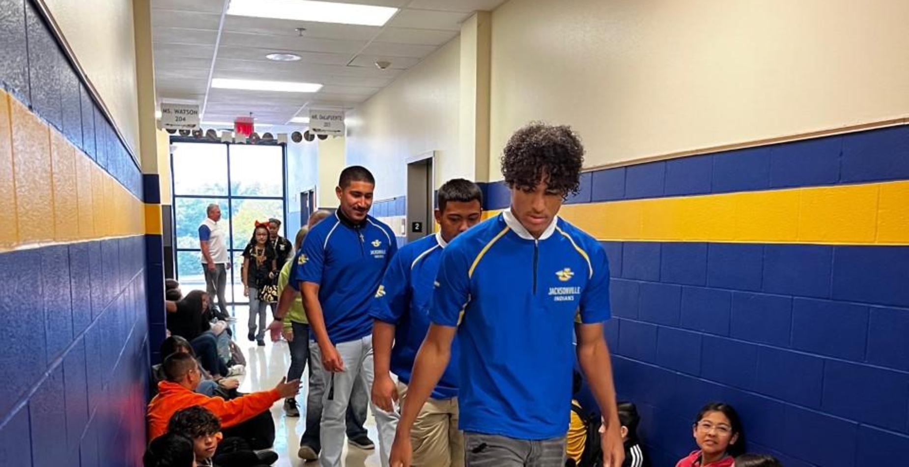 Football players visit Nichols