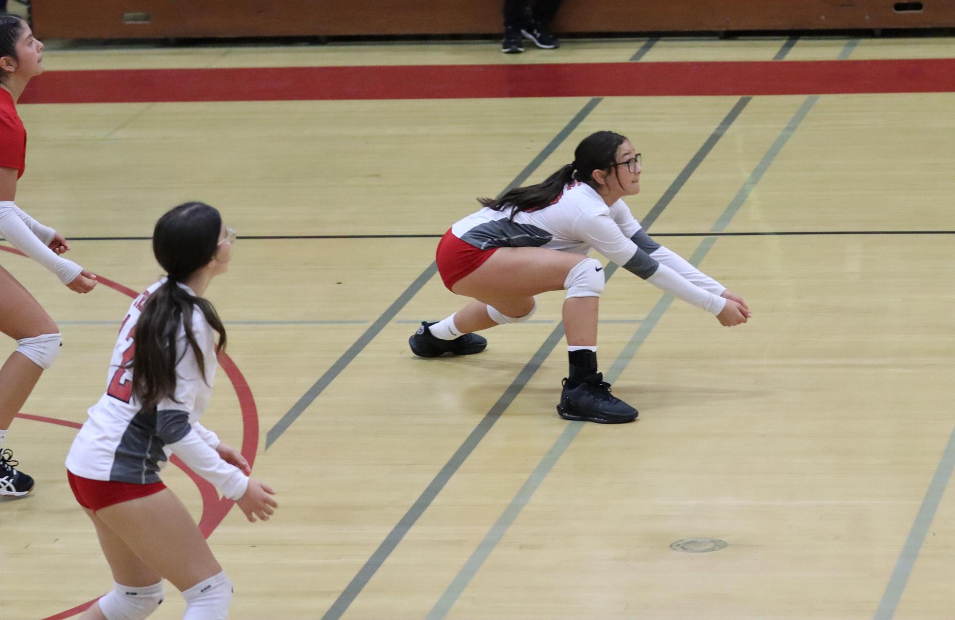 junior varsity girls playing volleyball against Yosemite