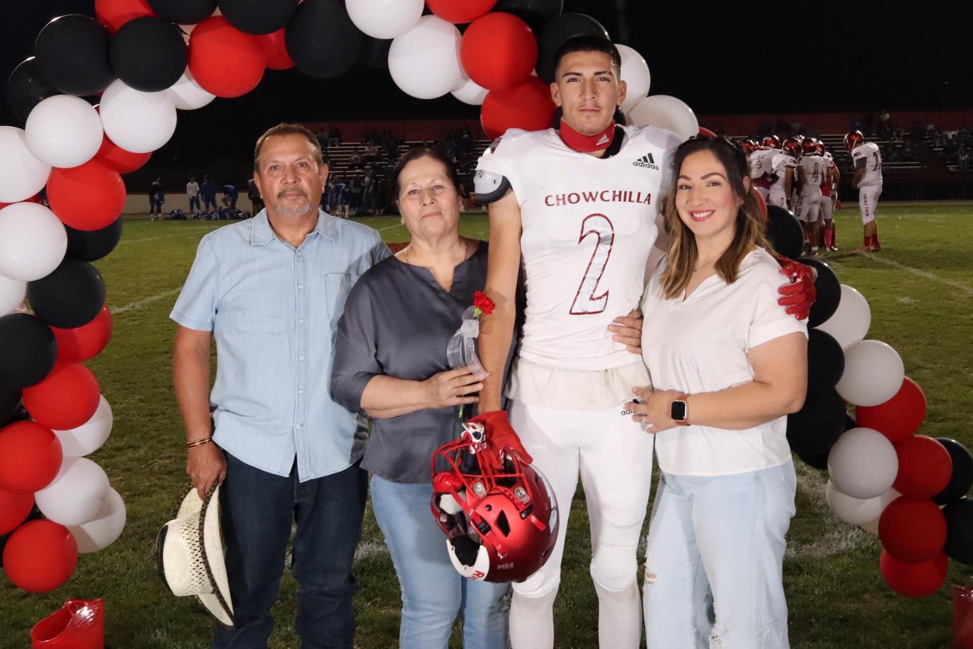 seniors and their escorts celebrating senior night