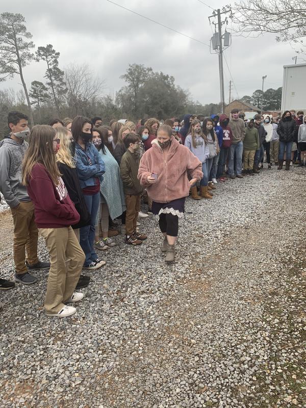 8th Grade Students gather to honor classmate's passing.