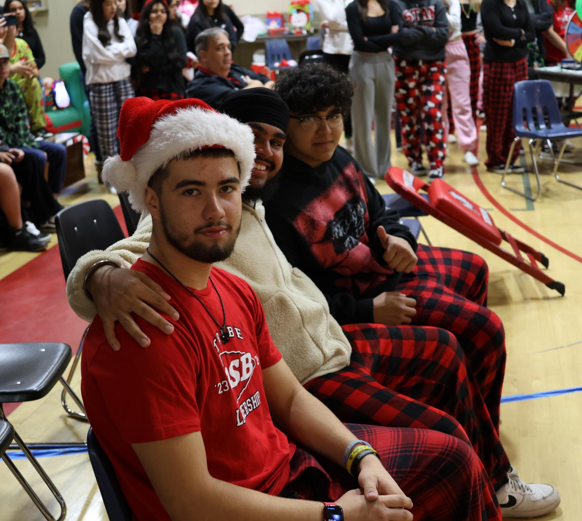 students and staff posing at the winter wishes rally