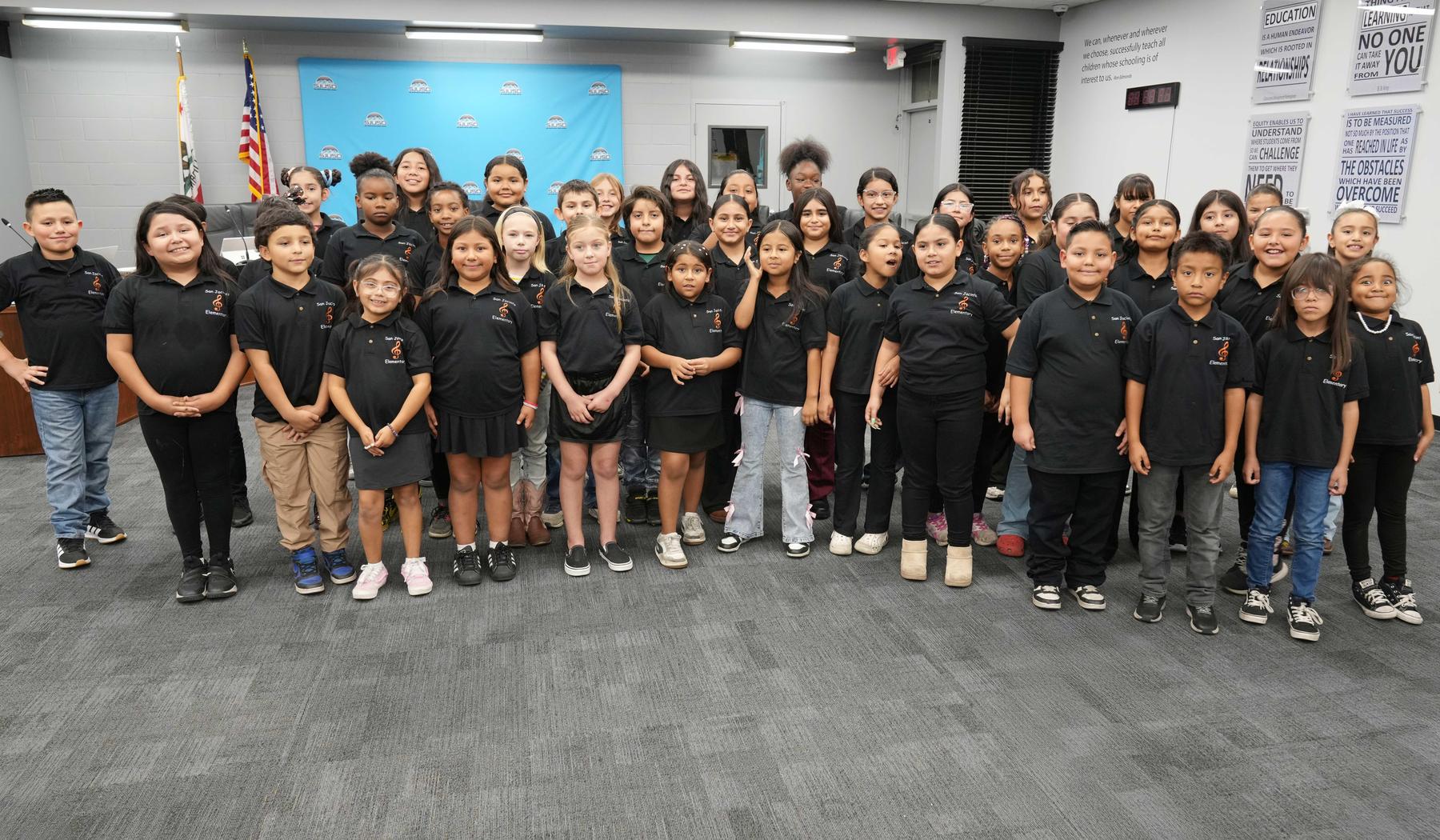 SJE elementary choir after Board performance