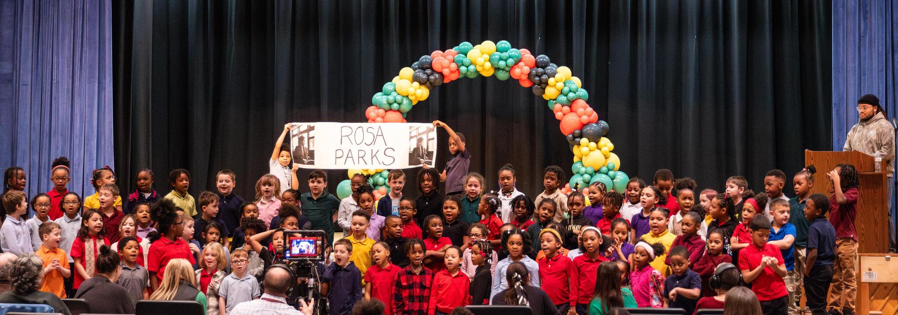 Students perform at a Black History Month celebration