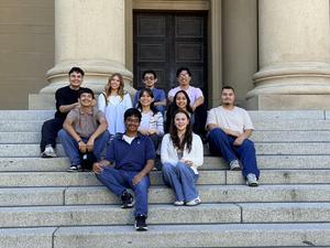Harmony Magnet Academy's Academic Decathlon team poses on the steps of a building at the State Championships in Santa Clara.