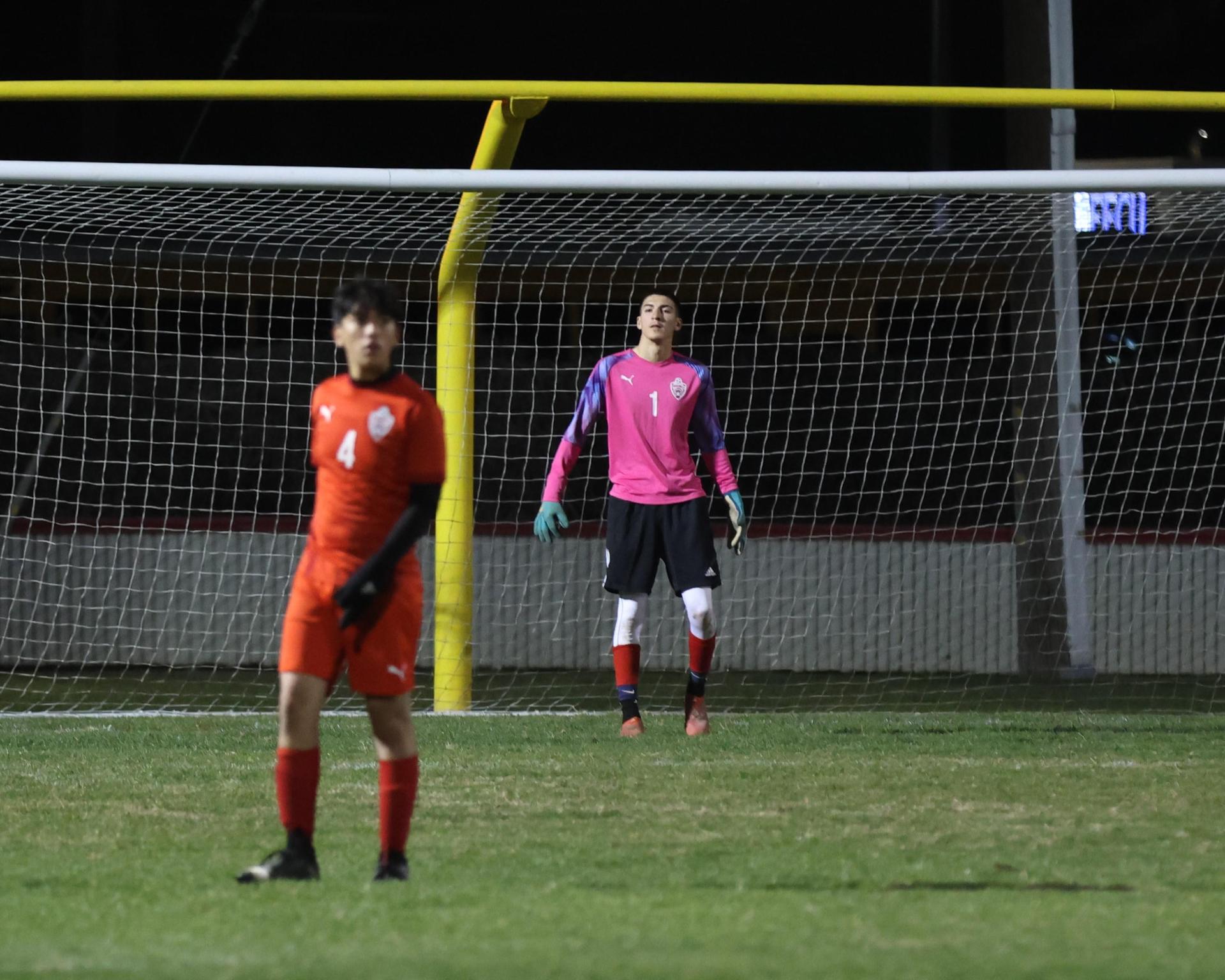 Varsity boys play soccer against Kingsburg