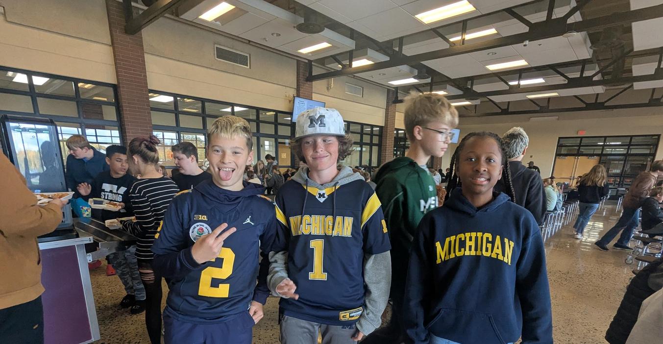 Students wear their Michigan attire during Michigan vs. Michigan State day.