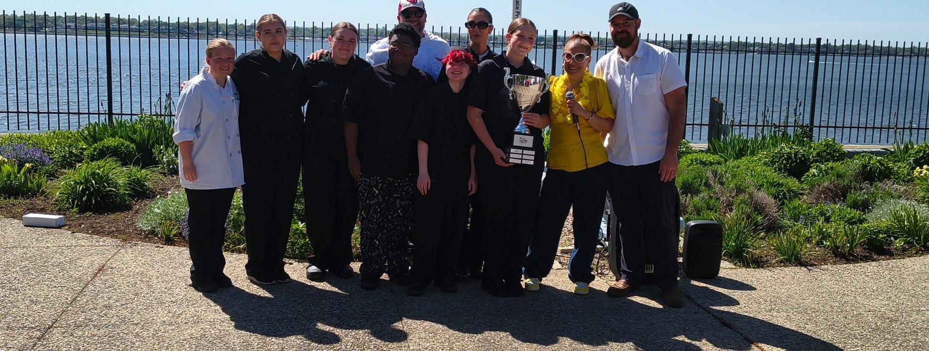 Falcons on the Fly Food Truck Culinary Arts students pose after winning the Savory award against all the other RI Culinary CTE program food trucks in the statewide competition.