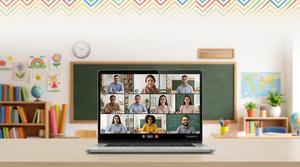 A virtual meeting displayed on a laptop with nine participants in a classroom setting.