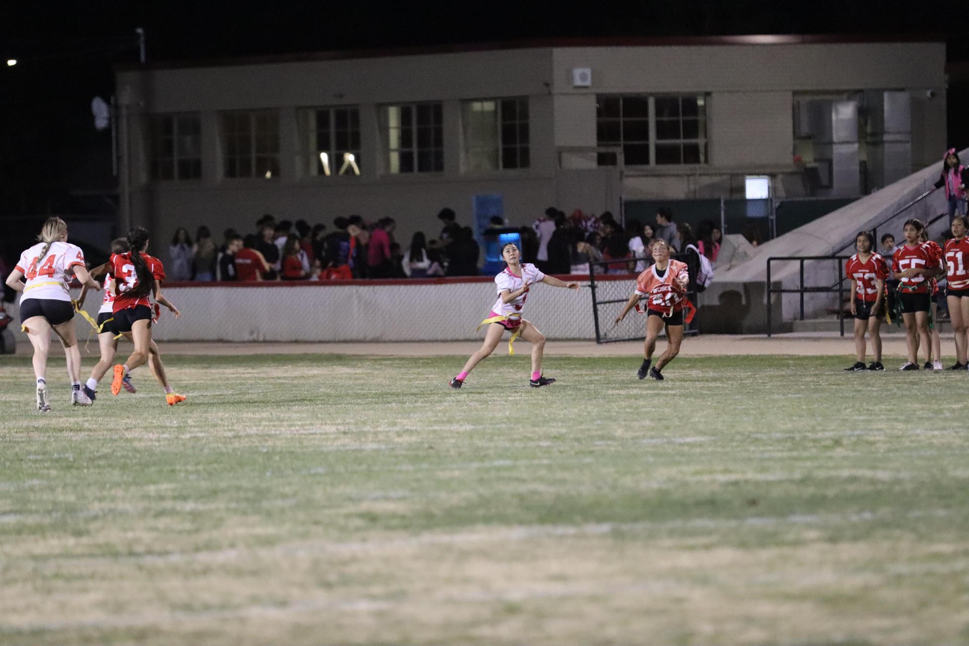 girls playing flag football