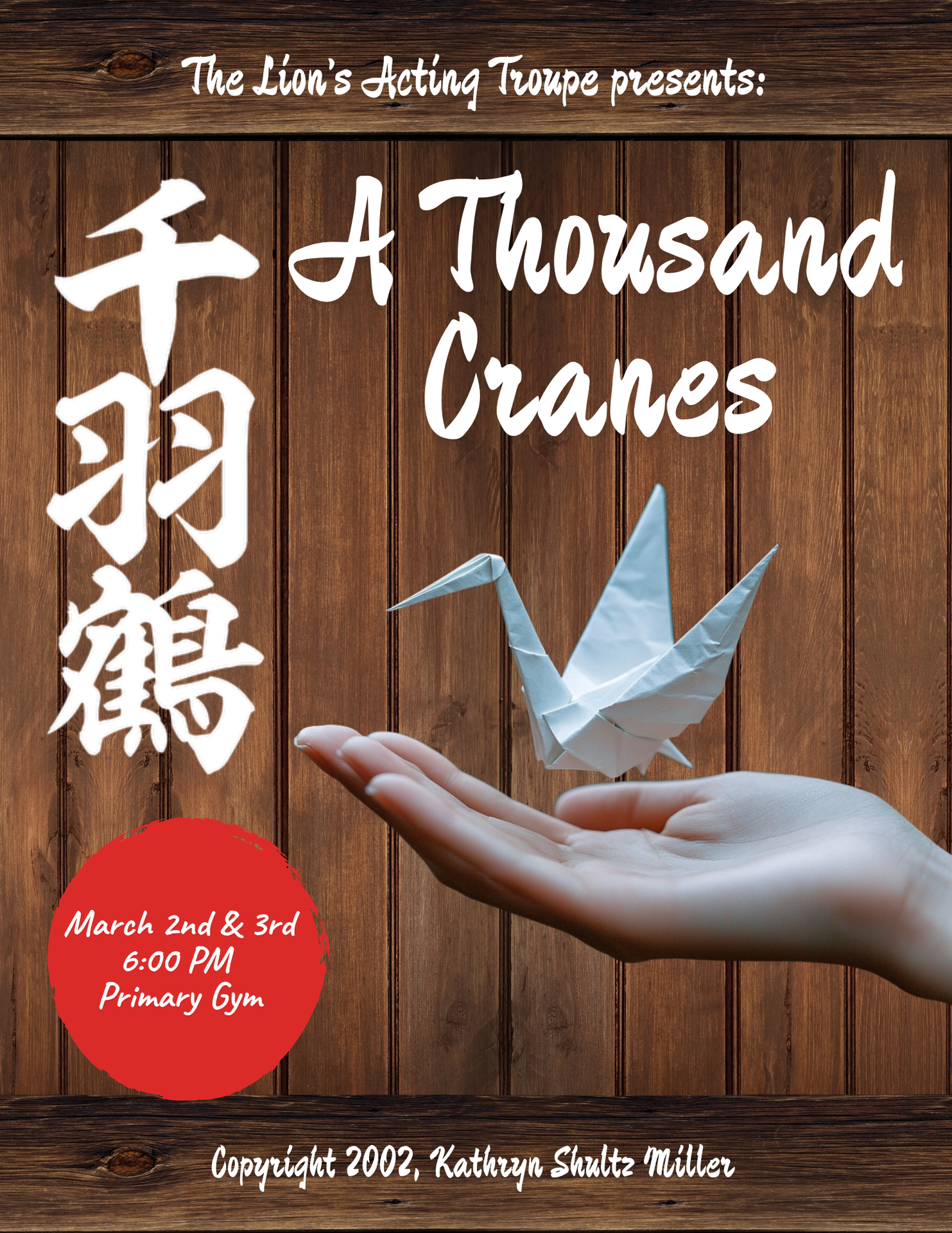 A hand holds a folded white paper crane