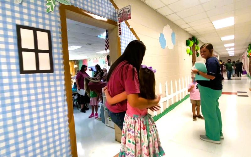 West Lauderdale Elementary Open House Teacher Hugging a Student