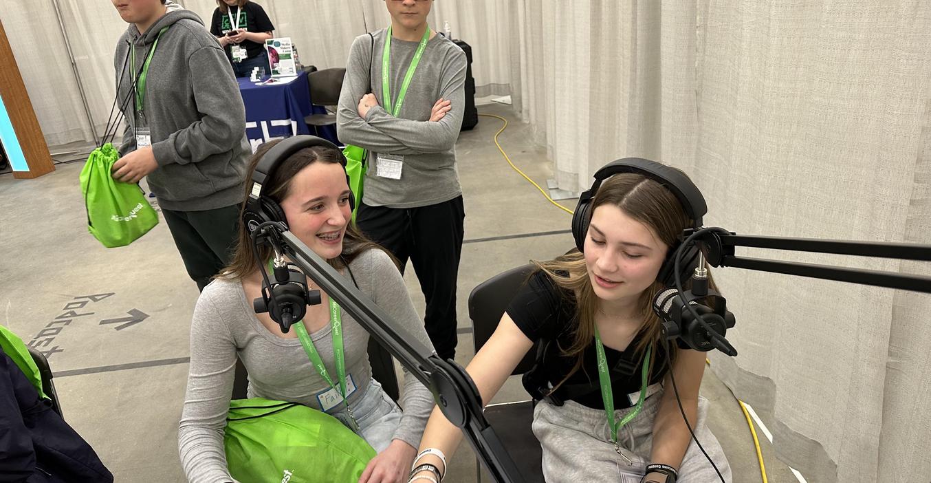 Two students try their hand at broadcasting at the annual Career Quest event in Grand Rapids.