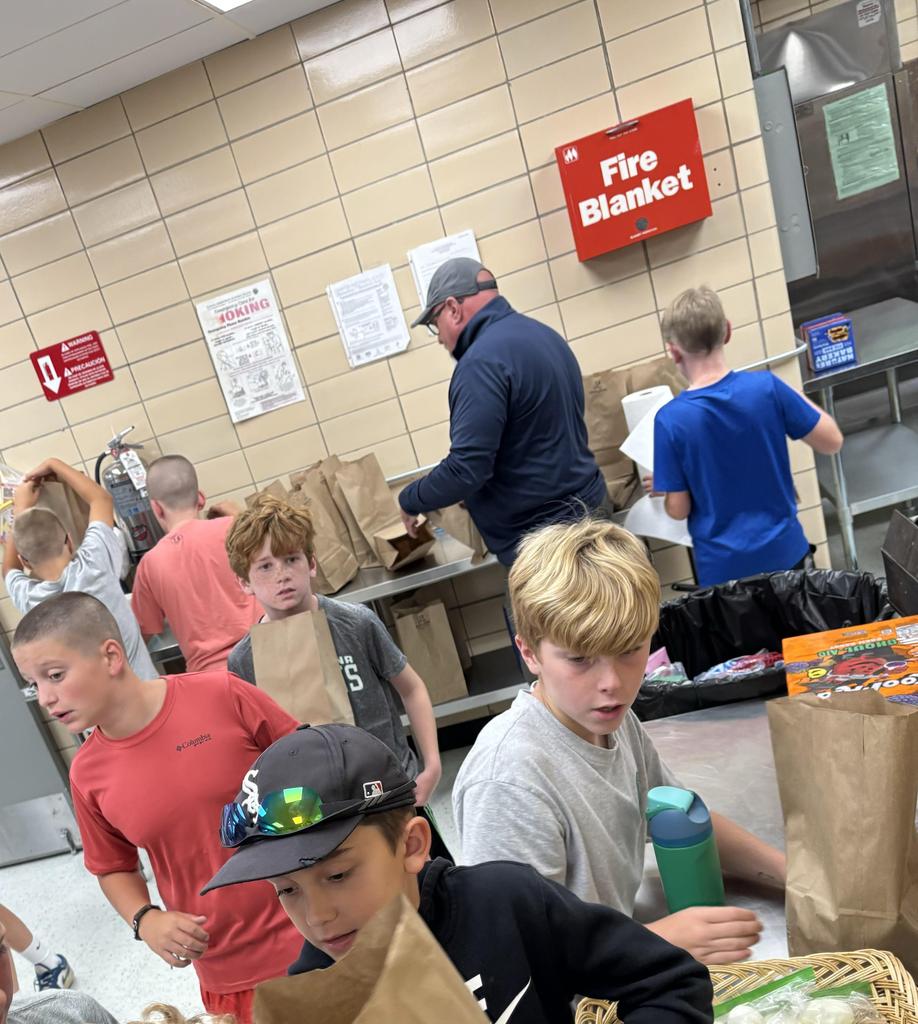 JV football team making Uncle Pete's lunches