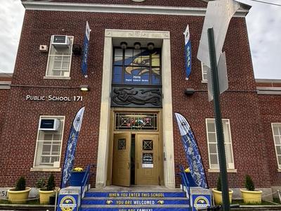 FRONT OF THE SCHOOL BUILDING