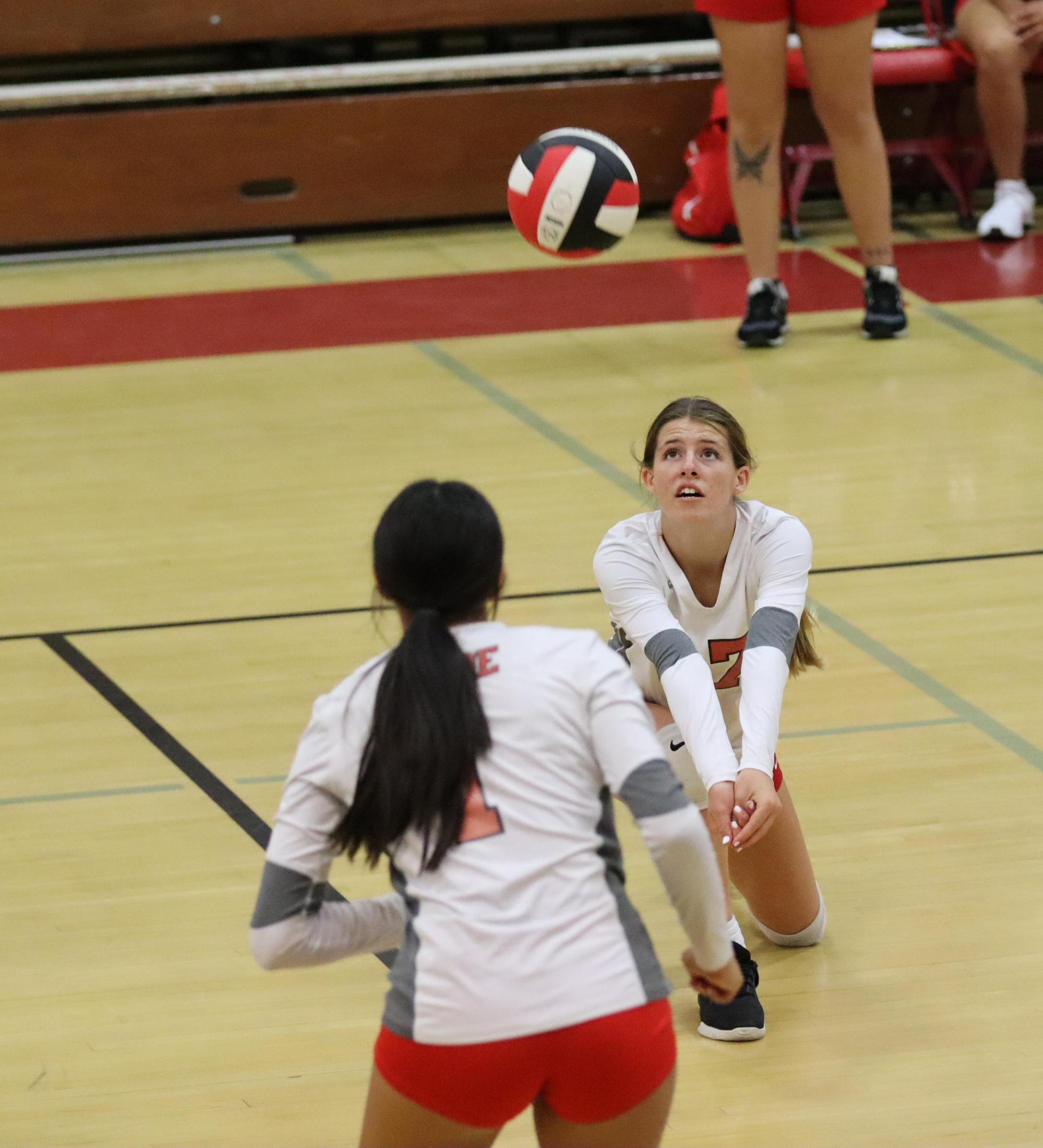 junior varsity girls playing volleyball against Liberty