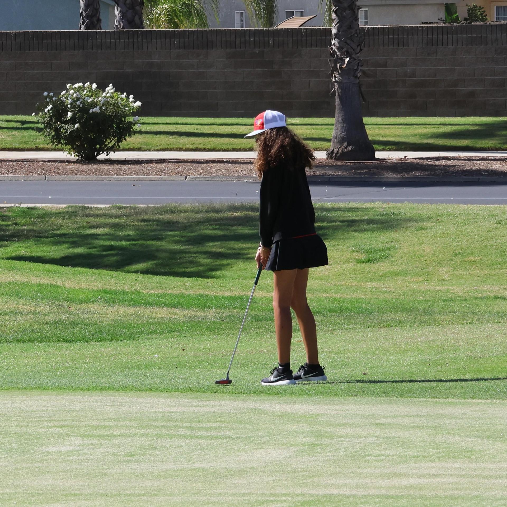 Girls golfers in action at the championships