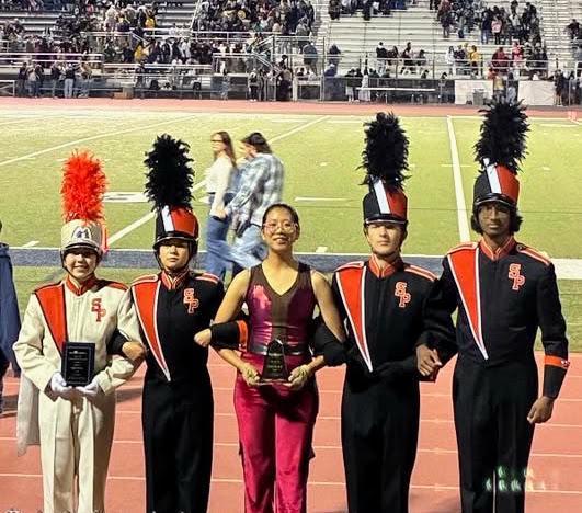 SPHS Marching Band and Color Guard representatives receive their awards during a recent Western Band Association competition. (Photo Courtesy of Tim Orindgreff)