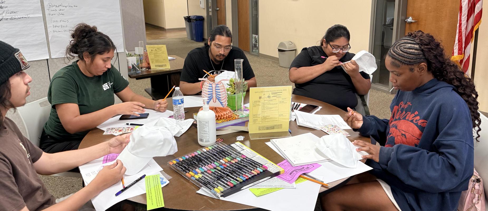 Students from our Fresno site working on an art project