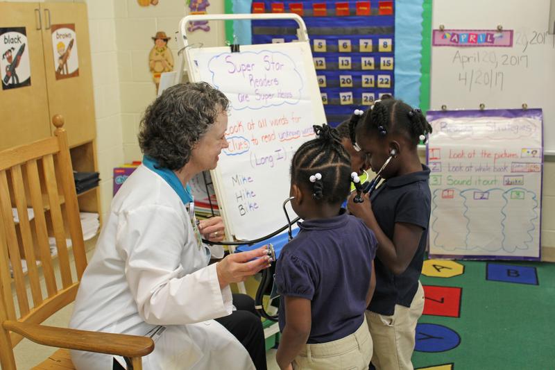 school nurse with students