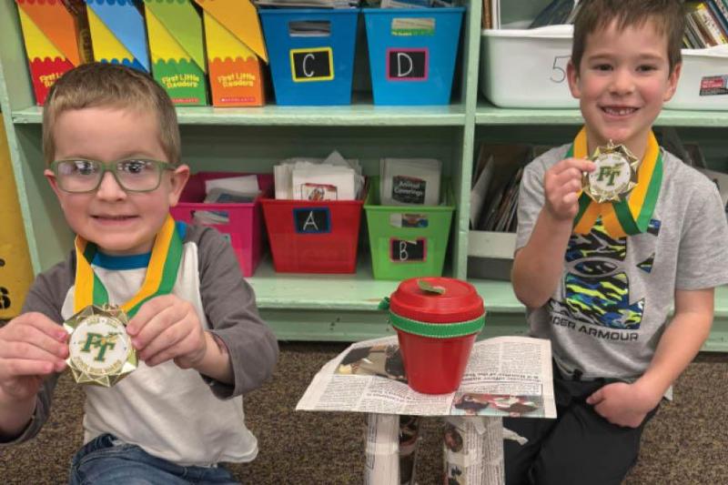 2 Sunrise kindergarteners built the strongest table in their class and earned medals