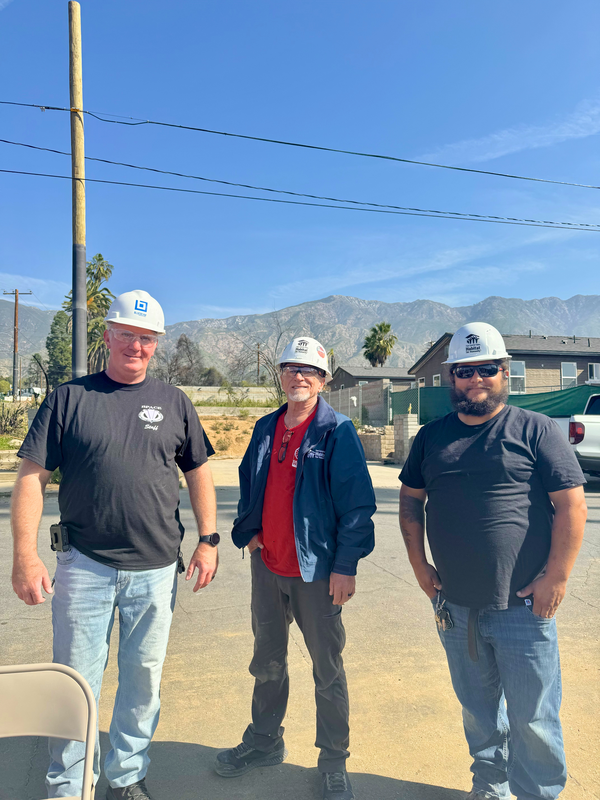 BPACE Career and Technical Education Chair and Teacher Jeffrey Palmer and SGV Habitat Site Leaders pose for a photo.