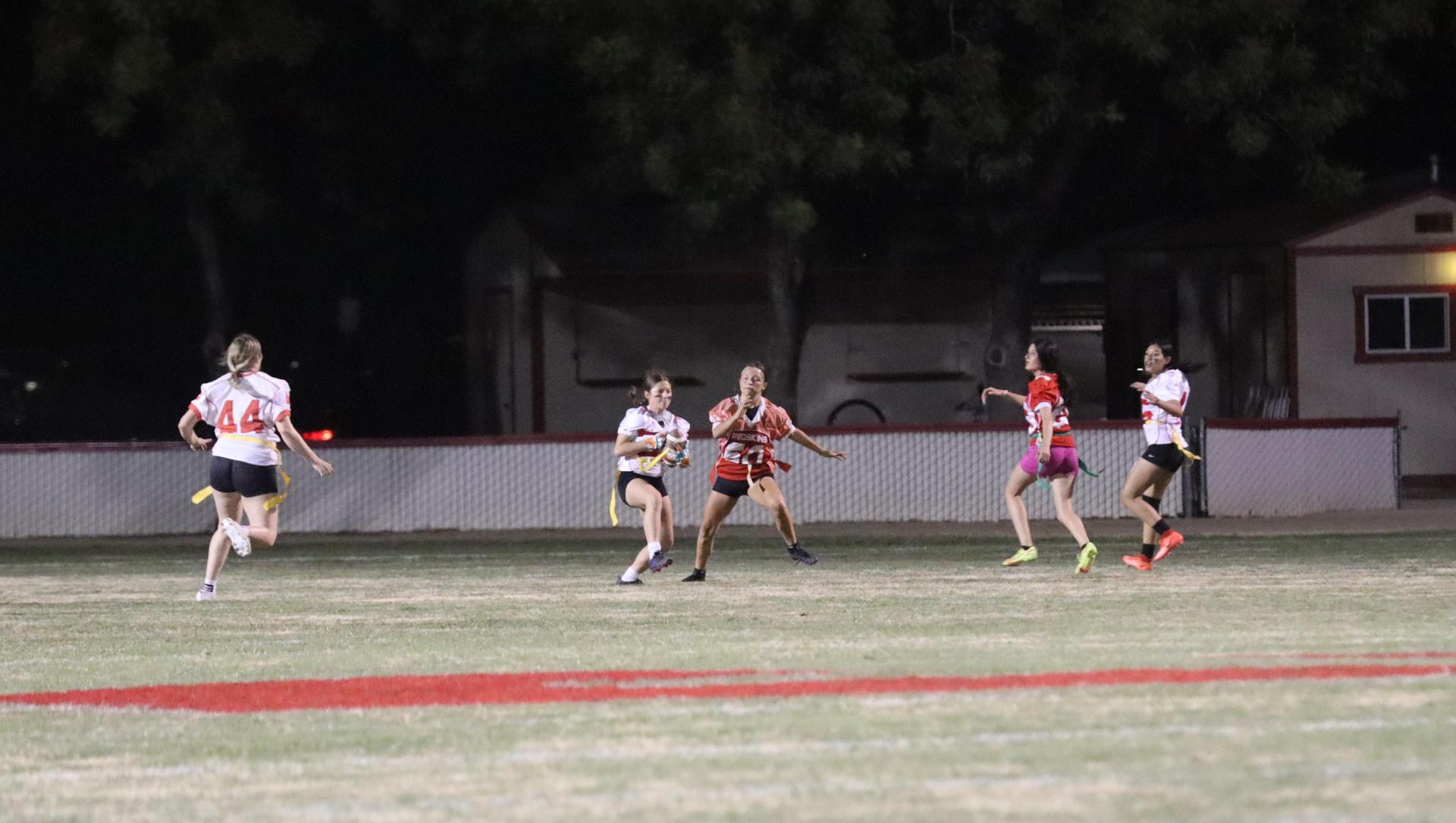 girls playing flag football