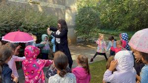 Morah Rivkah sprinkles water to create a "mabul"