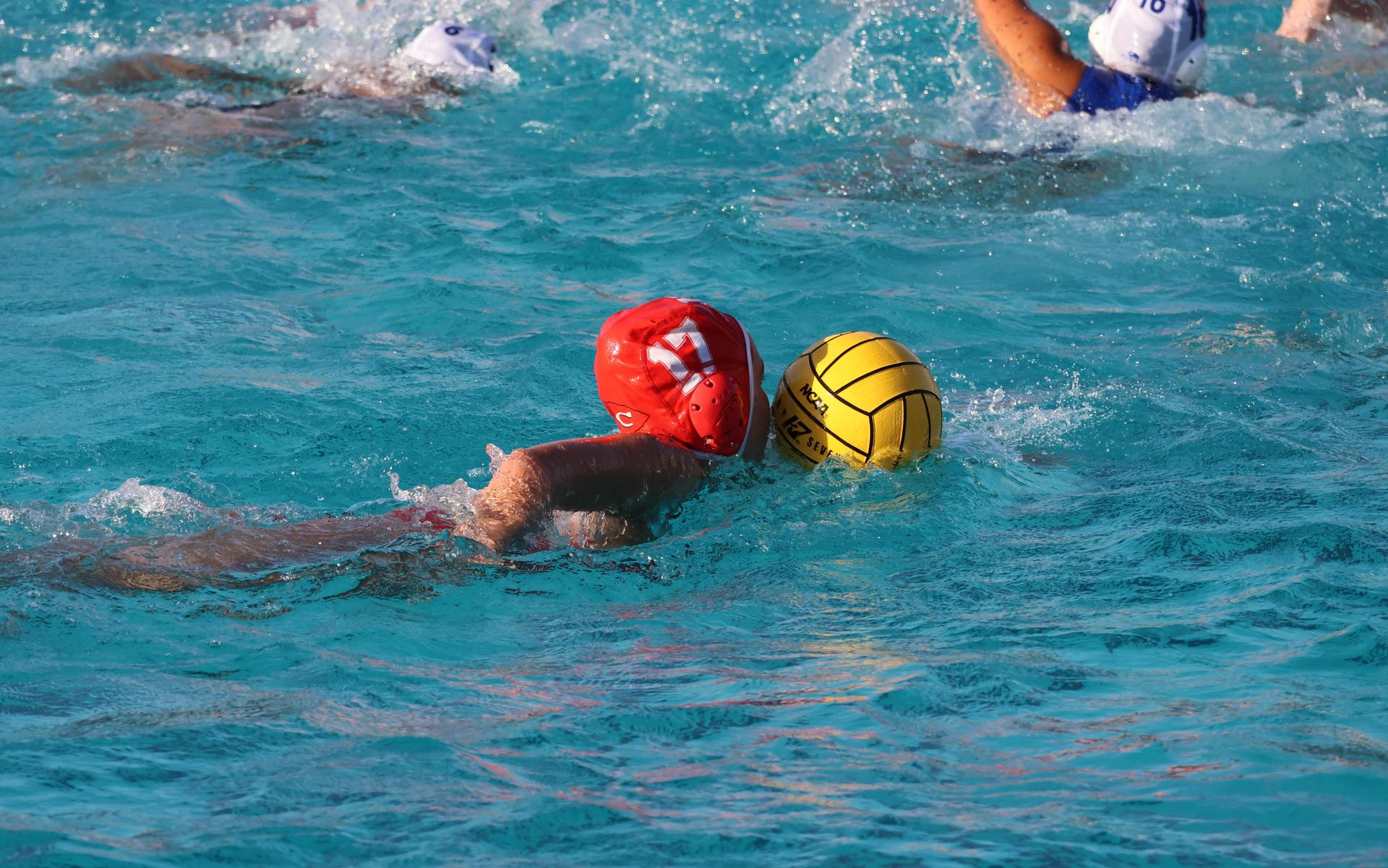 girls playing water polo against Sanger West