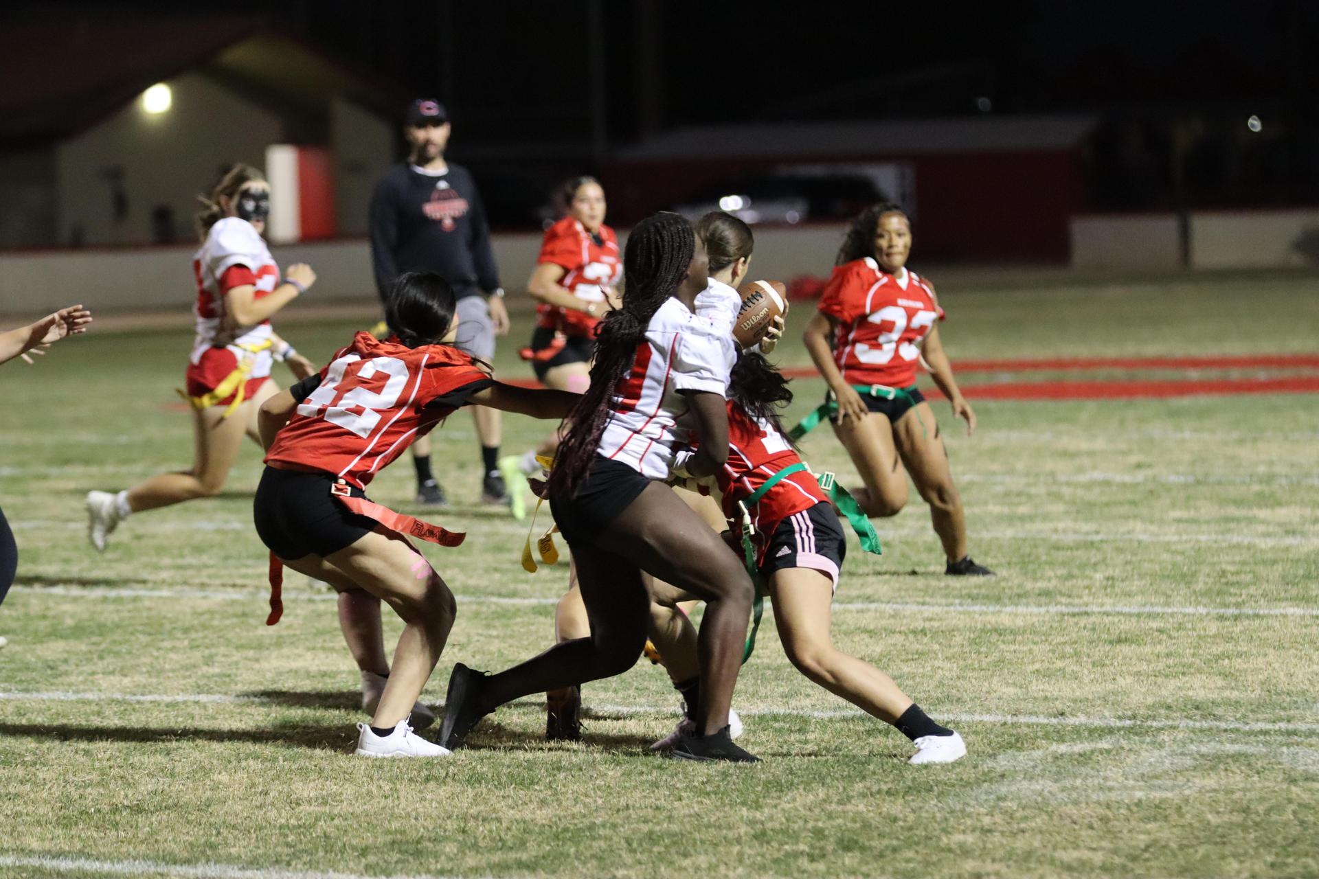 girls playing flag football