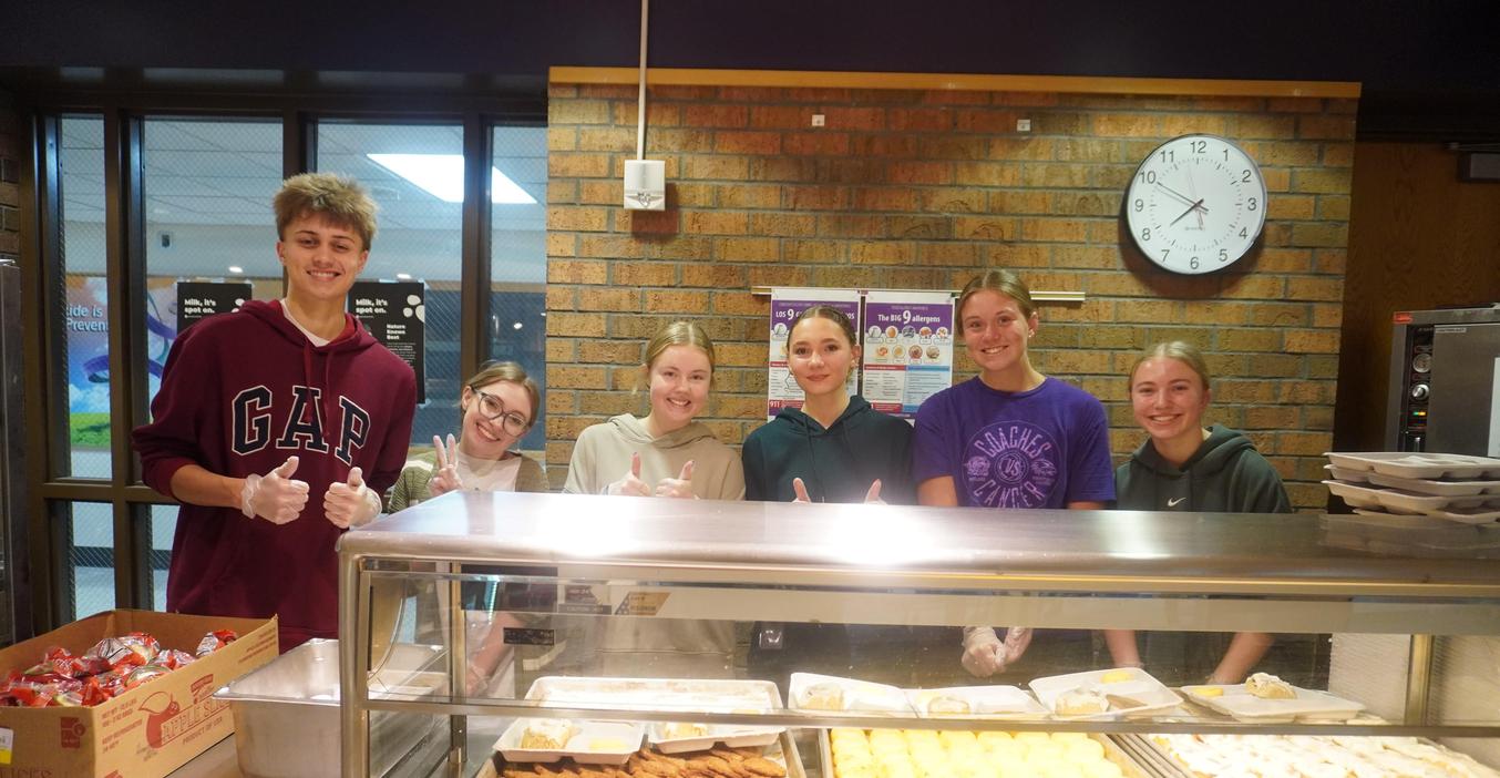 Members of the TKHS Hope Squad serve breakfast to classmates.
