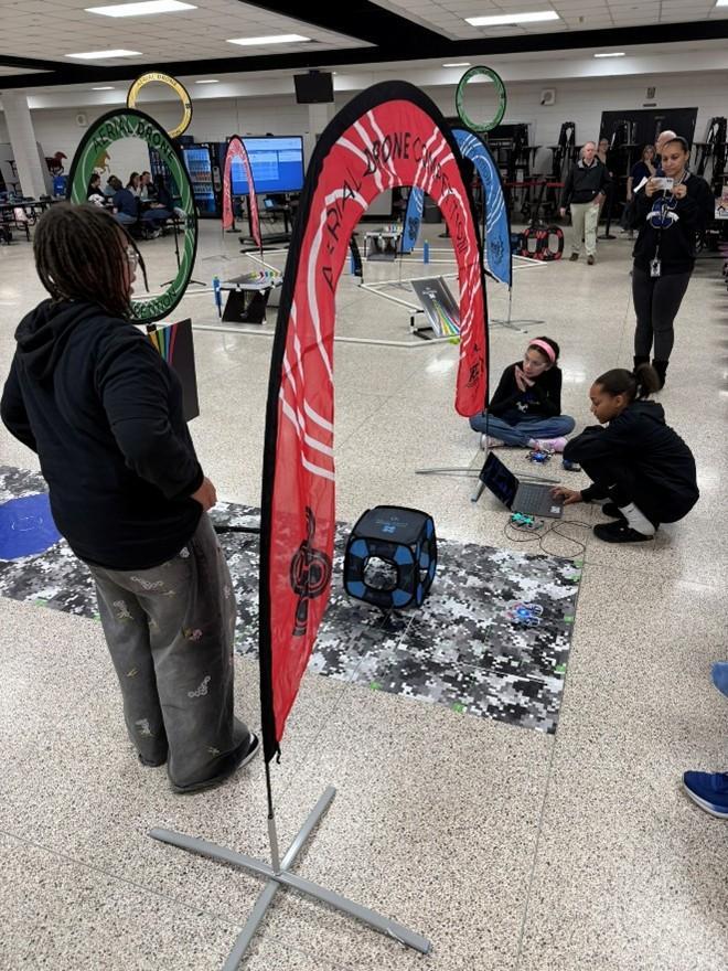 students competing in drone competition