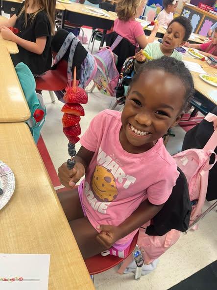 In Ms. Ladner 1st grade class today, students had a delicious hands-on learning experience as they created their own fruit kabobs while practicing partners for 10!