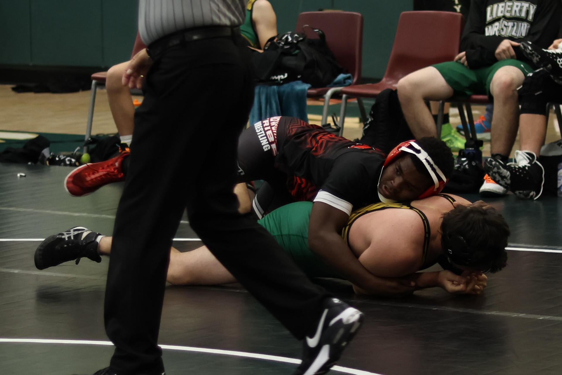 boys wrestling at liberty duals