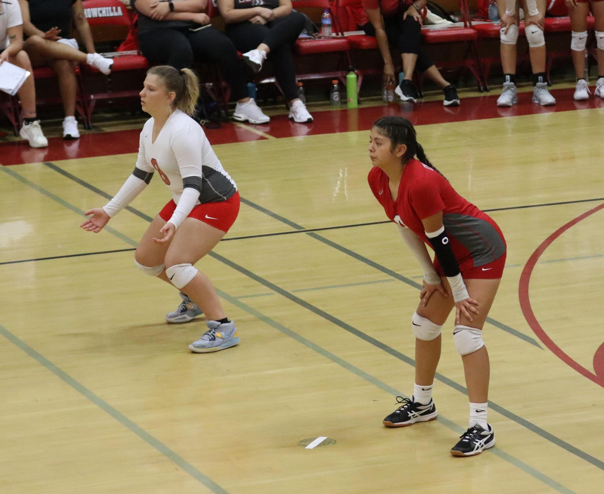 junior varsity girls playing volleyball against Mendota