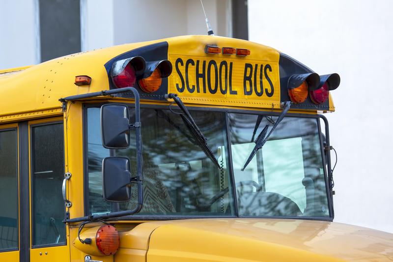 The front of a school bus is shown.