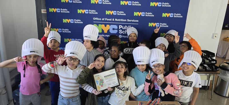 Students tasting food for school lunch menu