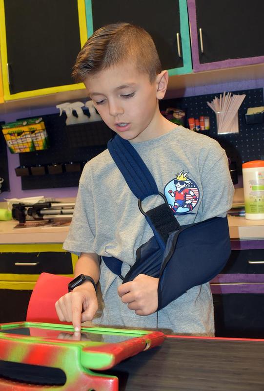 Students using an iPad