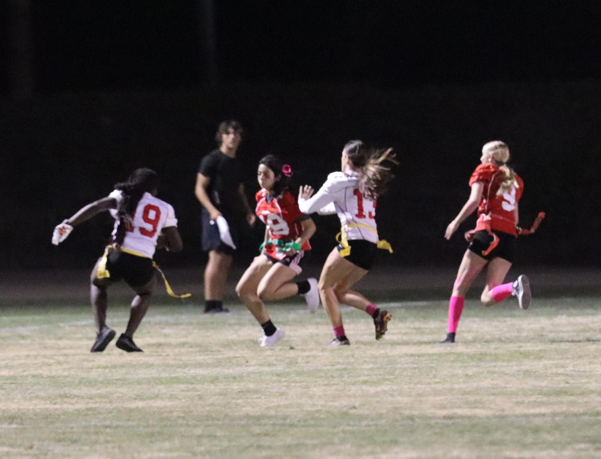 girls playing flag football
