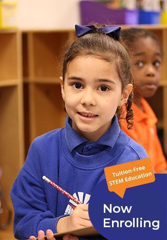 HSA Lorain South student writing on clipboard