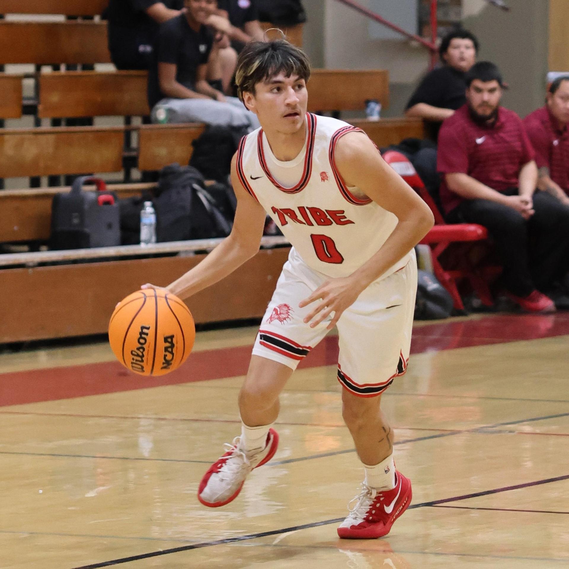 Varsity Boys Basketball playing vs. Orosi 37