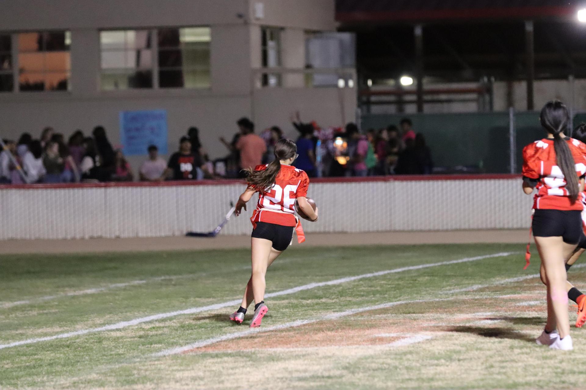 girls playing flag football
