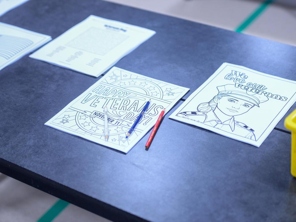 Coloring pages on a table for Veteran's Day.