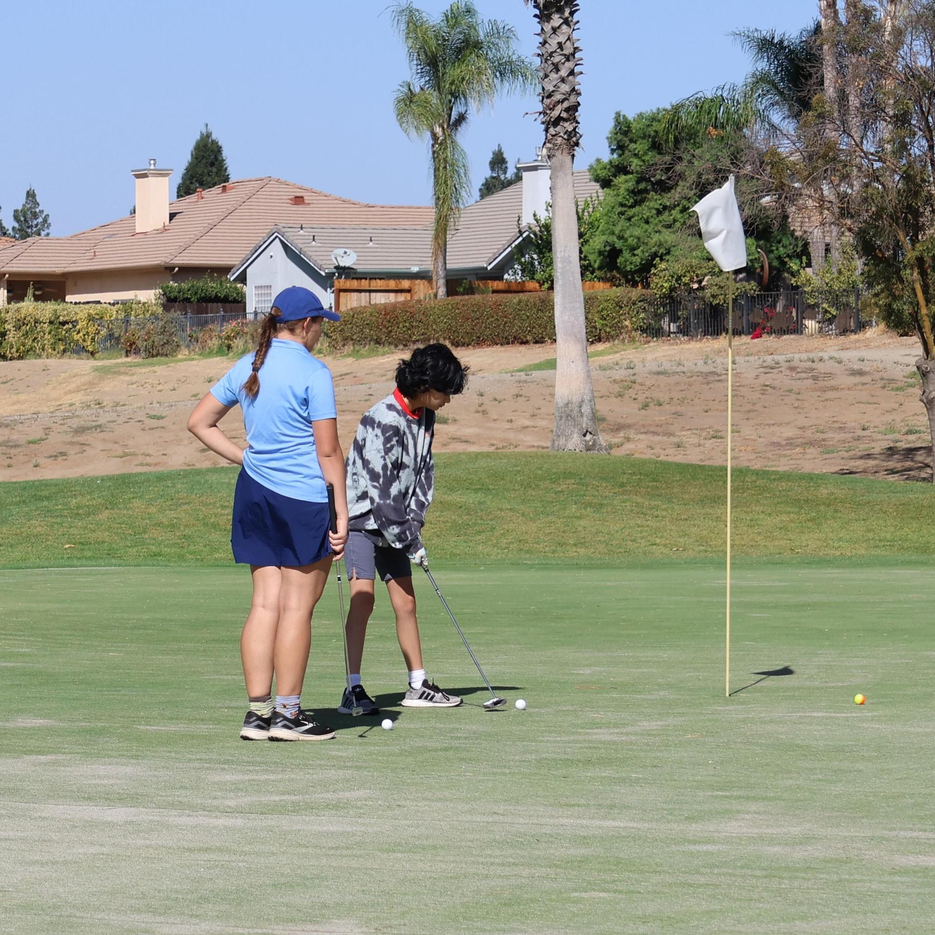 Girls golfers in action at the championships