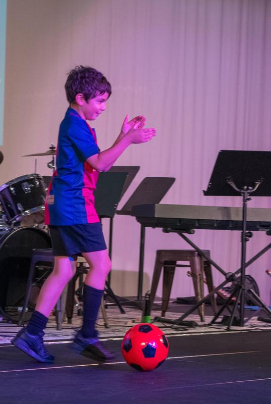 Lower Schooler preforming Soccer tricks during the talent show