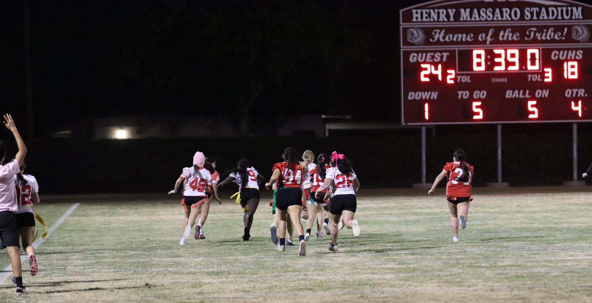 girls playing flag football