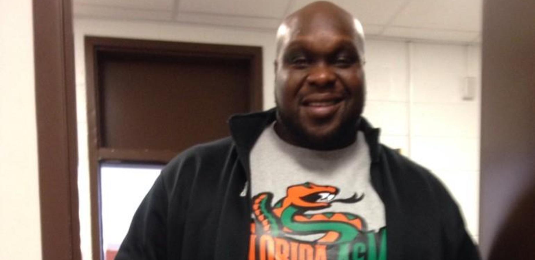 Assistant Principal wearing college shirt for College Day Wednesday
