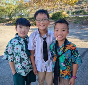 3 students wearing ties