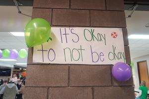 "It's Okay to not be Okay" sign.