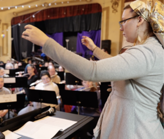 Amber Sheeran conducting adult orchestra