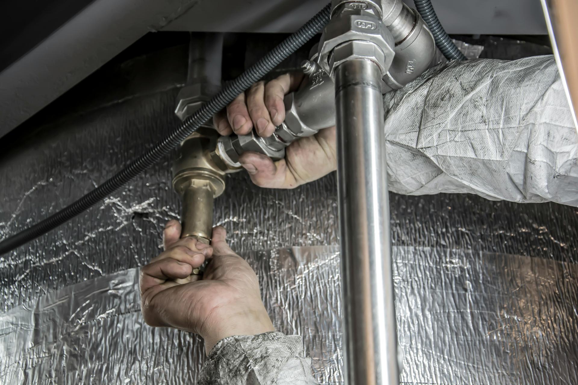 plumbing worker image